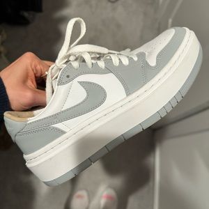 Grey and white Nike Air Jordan 1